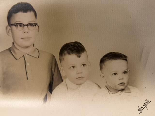Studio portrait of three young brothers